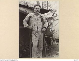 BOUGAINVILLE, SOLOMON ISLANDS. 1944-12-08. CORPORAL R.P. ALLAN, ANGAU, AT 109 CASUALTY CLEARING STATION, AUSTRALIAN ARMY MEDICAL CORPS. HE CARRIED A WOUNDED AMERICAN CAPTAIN THROUGH MACHINE GUN ..