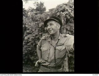 VIVIGANI, GOODENOUGH ISLAND, PAPUA. 1943-11. 401751 FLYING OFFICER (FO) ARCH W. MOORE OF BENDIGO, VIC, A PILOT OF NO. 79 (SPITFIRE) SQUADRON RAAF. ON 1943-11-28, FO MOORE WAS ON A TEST FLIGHT OVER ..