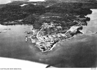MANUS ISLAND, ADMIRALTY ISLANDS. 1949-09. AERIAL VIEW OF LOMBRUM, NAVAL HEADQUARTERS ON MANUS
