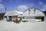 Federated States of Micronesia, two men outside department store in Chuuk State