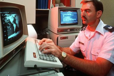 MSGT Tim Woodall of Headquarters, Pacific Communications Division, works with the Advanced Prophet High Frequency Prediction subsystem of the Tactical Frequency Record Management System. The subsystem allows a manager to select the optimum frequency for use by a given command and control system