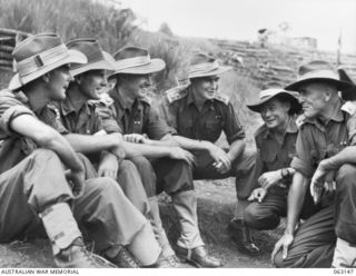 DONADABU, PAPUA, NEW GUINEA. 1944-01-01. PERSONNEL OF THE 58/59TH INFANTRY BATTALION WHO WERE DECORATED DURING THE BOBDUBI- SALAMAUA CAMPAIGN, PHOTOGRAPHED AT THE 15TH AUSTRALIAN INFANTRY BRIGADE ..