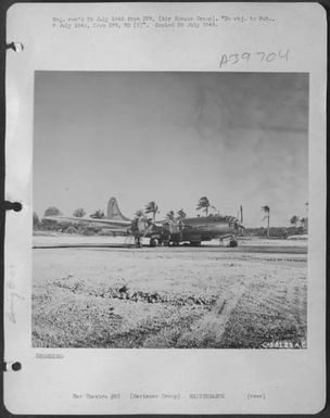 Mechanics Are Shown Working On A B-29 At The Guam Air Depot Constructed By Aviation Engineers. Marianas Gp. (U.S. Air Force Number C58121AC)