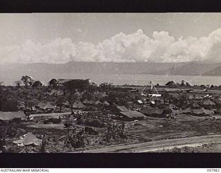 LAE, NEW GUINEA. 1943-10-12. VIEW OF PART OF THE TOWN LOOKING TOWARDS THE MOUTH OF THE MARKHAM RIVER, FROM OBSERVATION HILL (MOUNT LUNEMAN)