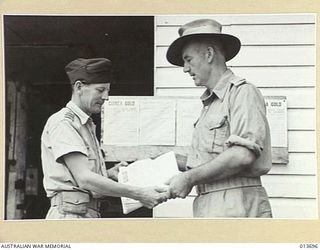 1942-12-01. NEW GUINEA. TROOPS IN PORT MORESBY ARE KEENLY INTERESTED IN THE ARMY NEWSPAPER "GUINEA GOLD". PRODUCED UNDER DIFFICULT CONDITIONS, THE PAPER IS DISTRIBUTED FREE TO BOTH AUSTRALIAN AND ..