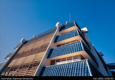 New Caledonia - multi-storey building, blue tiles, French flag
