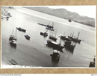 NAPA NAPA, NEW GUINEA. 1943-11-12. SMALL CRAFT STANDING OFF THE 1ST AUSTRALIAN WATERCRAFT WORKSHOPS, AUSTRALIAN ELECTRICAL AND MECHANICAL ENGINEERS