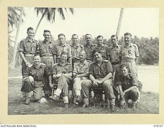 MILILAT, NEW GUINEA. 1944-08-07. PERSONNEL OF THE ADJUTANT AND QUARTERMASTER STAFF, HEADQUARTERS, 5TH DIVISION OUTSIDE THEIR TENT OFFICE. IDENTIFIED PERSONNEL ARE:- NX190495 PRIVATE I.E. HUGHES ..
