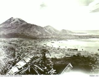 NEW BRITAIN, 1945-09. GENERAL VIEW OF THE RABAUL AREA AND PART OF SIMPSON HARBOUR LOOKING TOWARDS THE ENTRANCE OF THE HARBOUR. (RNZAF OFFICIAL PHOTOGRAPH.)