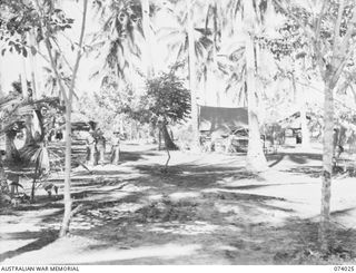 SIAR, NEW GUINEA. 1944-06-18. ADMINISTRATION AREA AND OFFICERS QUARTERS AT HEADQUARTERS, 15TH INFANTRY BRIGADE. IDENTIFIED PERSONNEL ARE:- VX104157 CAPTAIN T.A. MOLOMBY (1); VX112187 CAPTAIN L.J. ..