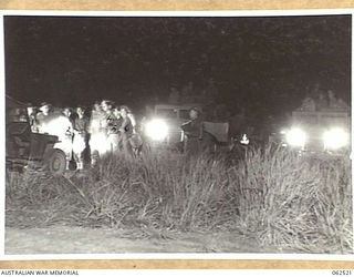 WARD'S DROME, PORT MORESBY AREA, PAPUA, NEW GUINEA. 1944-01-06. TROOPS OF THE 15TH AUSTRALIAN INFANTRY BRIGADE, JUST ARRIVED AT WARD'S DROME FROM THE MAIN MARSHALLING AREAS, RECEIVING FINAL ..