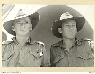 AT SEA. 1944-10-07. VX58293 LANCE CORPORAL J.M. DORAN, EX TIMOR COMMANDO (1) AND NX94082 SERGEANT D.M. COOK (2) MEMBERS OF THE 2ND FIELD SECURITY SECTION ATTACHED TO THE 36TH INFANTRY BATTALION ..