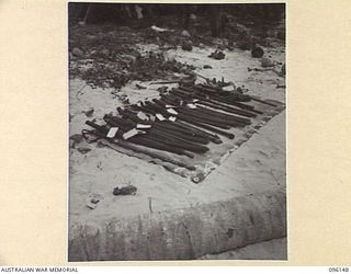 MUSCHU ISLAND, NEW GUINEA. 1945-09-10. SOME OF THE JAPANESE SWORDS SURRENDERED TO STAFF OFFICERS OF 6 DIVISION. THE ISLAND WAS SURRENDERED BY REAR-ADMIRAL SATO TO MAJOR GENERAL ROBERTSON, GENERAL ..