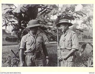 TOROKINA, BOUGAINVILLE. 1945-07-19. LIEUTENANT W. KAAS, AMENITIES OFFICER, 1 MARINE AIRCRAFT WING (US) (1) WITH MAJOR W.A. OLDFIELD, AMENITIES OFFICER AT HEADQUARTERS 2 CORPS (2)