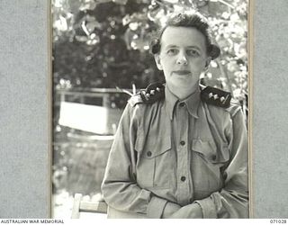 HELDSBACH MISSION, FINSCHHAFEN AREA, NEW GUINEA. 1944-03-13. VFX8396 SISTER J.M. LANGHAM, SISTER-IN-CHARGE OF THE 2/3RD CASUALTY CLEARING STATION, AUSTRALIAN ARMY NURSING SERVICE