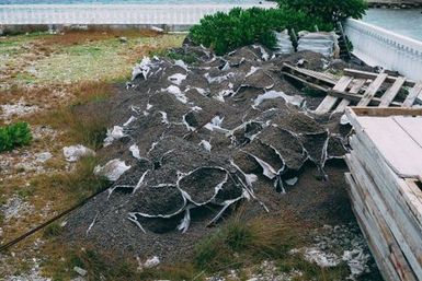 Opened bags of concrete sand, Fakaofo, Tokelau