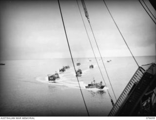 JACQUINOT BAY, NEW BRITAIN. 1944-11-04. A FLEET OF AMERICAN BARGES, (LCM'S) (LANDING CRAFT MECHANISED) AND (LCVP'S) (LANDING CRAFT VEHICLE-PERSONNEL) OF COMPANY B 594TH ENGINEER BOAT AND SHORE ..