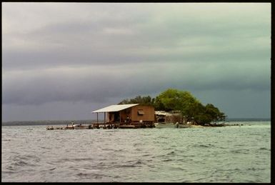 Buildings on lagoon, Manihiki, Cook Islands