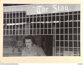 LAE, NEW GUINEA, 1945-05-21. SERGEANT S.M. DONOVAN, AUSTRALIAN WOMEN'S ARMY SERVICE (1), INVOICING FOR DIFFERENT UNITS IN THE BEER AND SPIRITS SECTION OF THE AUSTRALIAN ARMY CANTEENS SERVICE, ..