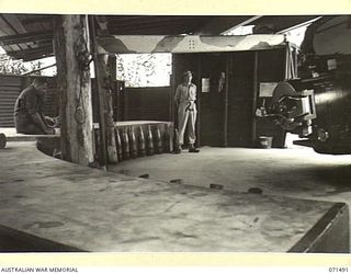 PORT MORESBY, PAPUA, NEW GUINEA. 1944-03-27. THE NO.2 GUN EMPLACEMENT HOUSING A 6 INCH GUN AT PAGA BATTERY, COAST ARTILLERY, AT THE MOUTH OF THE HARBOUR