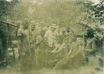 Missionary Benignus with pupils to whom he is learning how to build a wash house