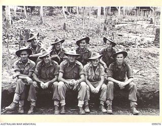GAZELLE, NEW BRITAIN. 1945-11-23. JAPANESE TROOPS CONSTRUCTED A PRISONER OF WAR CAMP UNDER THE SUPERVISION OF 13 FIELD COMPANY. SHOWN, LIEUTENANT J.B. SHIRLEY AND THE MEMBERS OF HIS SECTION WHO ..