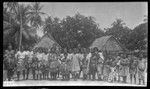 Group in front of houses