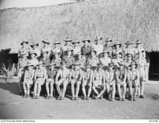 BISIATABU, NEW GUINEA. 1943-07-01. GROUP OF SOME OF THE OFFICERS AND WHITE NON COMMISSIONED OFFICERS OF THE 1ST PAPUAN INFANTRY BATTALION. LEFT TO RIGHT:- CAPTAIN A.B. LUETCHFORD, OFFICER ..