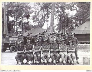 TOROKINA, BOUGAINVILLE. 1945-11-24. PERSONNEL OF BATTALION HQ GROUP, 27 INFANTRY BATTALION. (FOR IDENTIFICATION OF 15 NAMED PERSONNEL REFER TO PROVISIONAL CAPTION OR NAME INDEX)