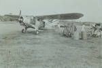 Refuelling norseman at Green River PP [Patrol Post], Piper Pacer to right, [Papua New Guinea], 1954