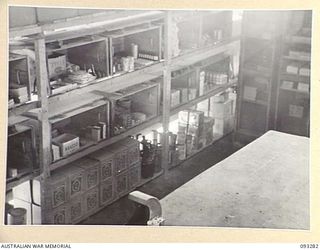 TOROKINA, BOUGAINVILLE, 1945-06-21. THE INTERIOR OF DETAIL NEW GUINEA SUB DEPOT, LHQ DENTAL STORES, HQ 4 BASE SUB AREA. PHOTOGRAPH TAKEN AT REQUEST OF DR. WORNER, VISITING AUSTRALIAN SCIENTIST