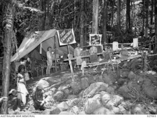 PAPUA, NEW GUINEA. 1942-09. THE SALVATION ARMY IN A FORWARD AREA OF THE OWEN STANLEY RANGES. THIS VERY WELCOME TENT, NEAR UBERI, WITH ITS ATTENDANT CUP OF COFFEE AND BISCUITS, WAS A GREAT BOON TO ..