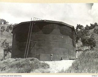 PORT MORESBY, PAPUA, 1944-02-25. FIFTY THOUSAND GALLON WELDED TANK, TYPE 606, AT THE BULK OIL INSTALLATIONS OF THE 1ST PETROLEUM STORAGE COMPANY