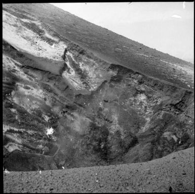 Piles of pumice and ash along the shoreline, Rabaul Harbour, New Guinea, 1937 / Sarah Chinnery