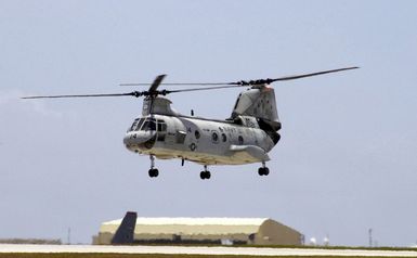 A US Navy (USN) CH-46 Sea Knight helicopter assigned to Helicopter Combat Support Squadron Five (HC-5), lands for the last time at Andersen Air Force Base (AFB), Guam. HC-5 is replacing its inventory of Sea Knight helicopters with Black Hawk helicopters