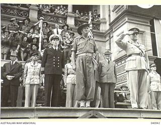 BRISBANE, AUSTRALIA. 1944-09-26. LIEUTENANT-GENERAL J. NORTHCOTT, CB, MVO, CHIEF OF THE GENERAL STAFF, TAKING THE SALUTE DURING THE MARCH THROUGH THE CITY OF BRISBANE OF THE 29TH AUSTRALIAN ..