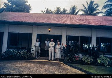 Group in front of building