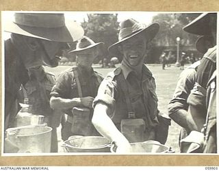 MELBOURNE, VIC. 1943-11-18. AFTER A LONG PERIOD OF FIGHTING IN NEW GUINEA, THE 17TH AUSTRALIAN INFANTRY BRIGADE, WAS GIVEN LEAVE, AT THE CONCLUSION OF WHICH THE UNIT STAGED A MARCH THROUGH THE ..