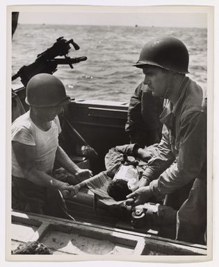 Coast Guardsmen Bring Wounded From Invasion Beach