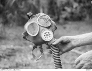 1942-10-01. NEW GUINEA. MILNE BAY. JAPANESE GAS MASKS FOUND AFTER THE UNSUCCESSFUL JAPANESE ATTACK ON MILNE BAY