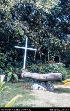 French Polynesia - Church of the Holy Family, Haapiti - cross and painted stone