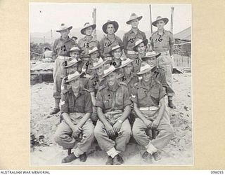 WIRUI BEACH, WEWAK AREA, NEW GUINEA. 1945-09-05. PERSONNEL OF 2/11 INFANTRY BATTALION. (FOR IDENTIFICATION OF 16 NAMED PERSONNEL REFER TO PROVISIONAL CAPTION OR NAME INDEX.)