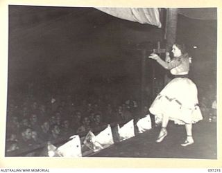 WEWAK POINT, NEW GUINEA. 1945-09-28. A SPANISH DANCE BY DARYA COLLIN FOR TROOPS ATTENDING A PERFORMANCE BY THE DARYA COLLIN BALLET TROUPE AT HEADQUARTERS 6 DIVISION. THE PERFORMANCE WAS MADE ..