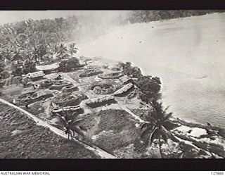 BORAM, NEW GUINEA. 1943-09. SIX GUN AIRCRAFT BATTERY ON WATERFRONT NEAR WEWAK. THE JAPANESE CONCENTRATED IN SIX GUN ACK ACK POSTS AND INSTEAD OF FIRING AT INDIVIDUAL ATTACKERS, FIRED UP TO A VORTEX ..