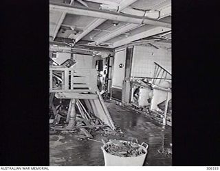 ORO BAY, NEW GUINEA. 1943-01-09. INTERNAL DAMAGE TO THE INTERIOR OF THE DUTCH TRANSPORT VAN HEUTSZ CAUSED BY JAPANESE AIR ATTACK. (NAVAL HISTORICAL COLLECTION)