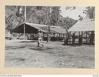 SORAKEN AREA, BOUGAINVILLE. 1945-04-03. THE MEN'S AND SERGEANTS' MESS UNDER CONSTRUCTION AT 11 INFANTRY BRIGADE