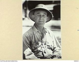 TOROKINA, BOUGAINVILLE. 1945-03-27. BISHOP T.J. WADE, BISHOP OF THE SOLOMON ISLANDS. HE WAS ON THE ISLAND DURING THE JAPANESE OCCUPATION AND ESCAPED BY SUBMARINE SHORTLY BEFORE THE AMERICAN LANDING