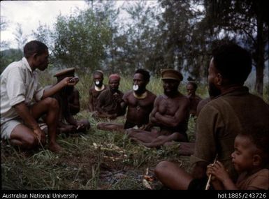 Men and children, recording conversation