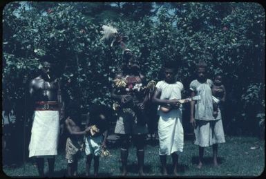 Policeman Maia [Maeya] (the guard for the Malaria Control Service building) and his family ready for singsing (2) : Rabaul, New Britain, Papua New Guinea, 1960-1961 / Terence and Margaret Spencer