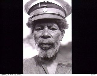 BUKAUA, NEW GUINEA. 1943-10-18. PORTRAIT OF DAHU, PARAMOUNT CHIEF OF THE BUKAUA DIVISION, MARKHAM ADMINISTRATION DISTRICT